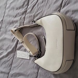 Calvin Klein bone colored cross body bag